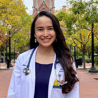 Young medical student smiling.