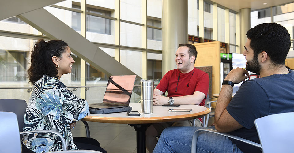 Students chat at the Daily Grind coffee shop.