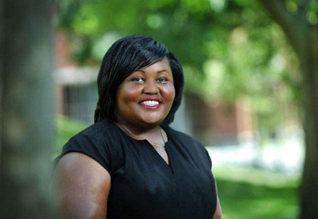 photo of Alicia Wilson smiling, standing outside