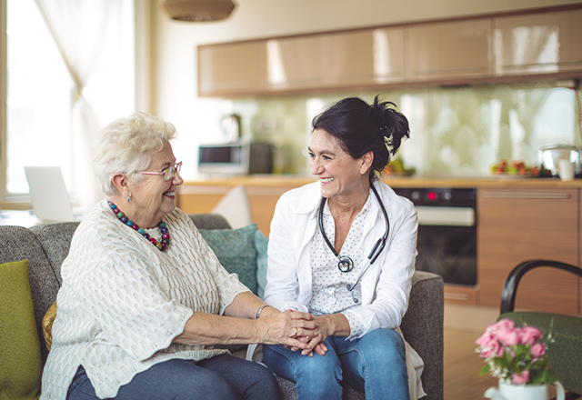 Nurse and elderly woman