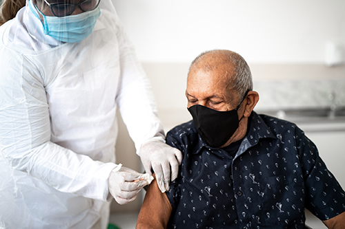 man getting vaccine