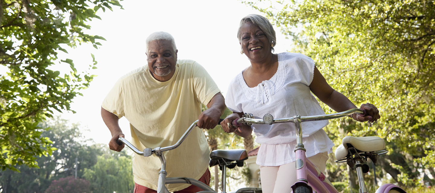 Senior couple biking