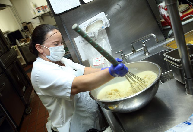 Miriam Zepeda whisking food on a bowl