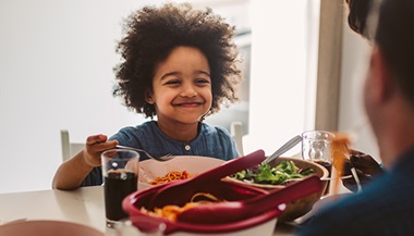 Boy eating dinner