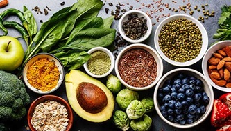 A colorful spread of fruits, vegetables, and nuts.