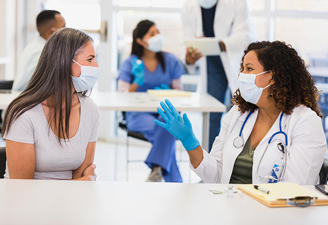 a young woman receiving a vaccine