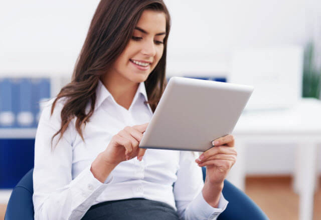 woman using tablet