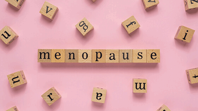 Letter blocks spelling out menopause