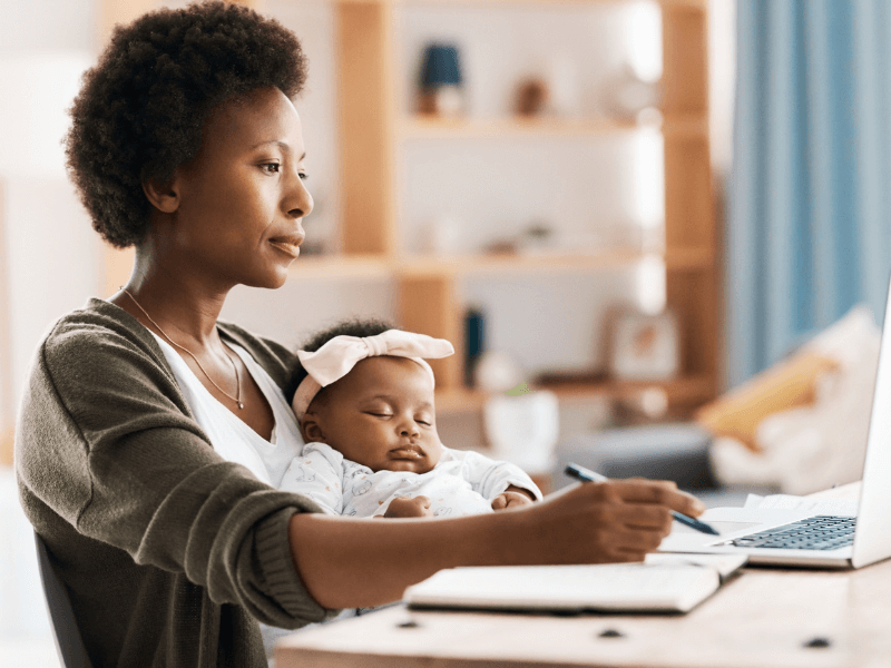 mom and baby in front of a computer