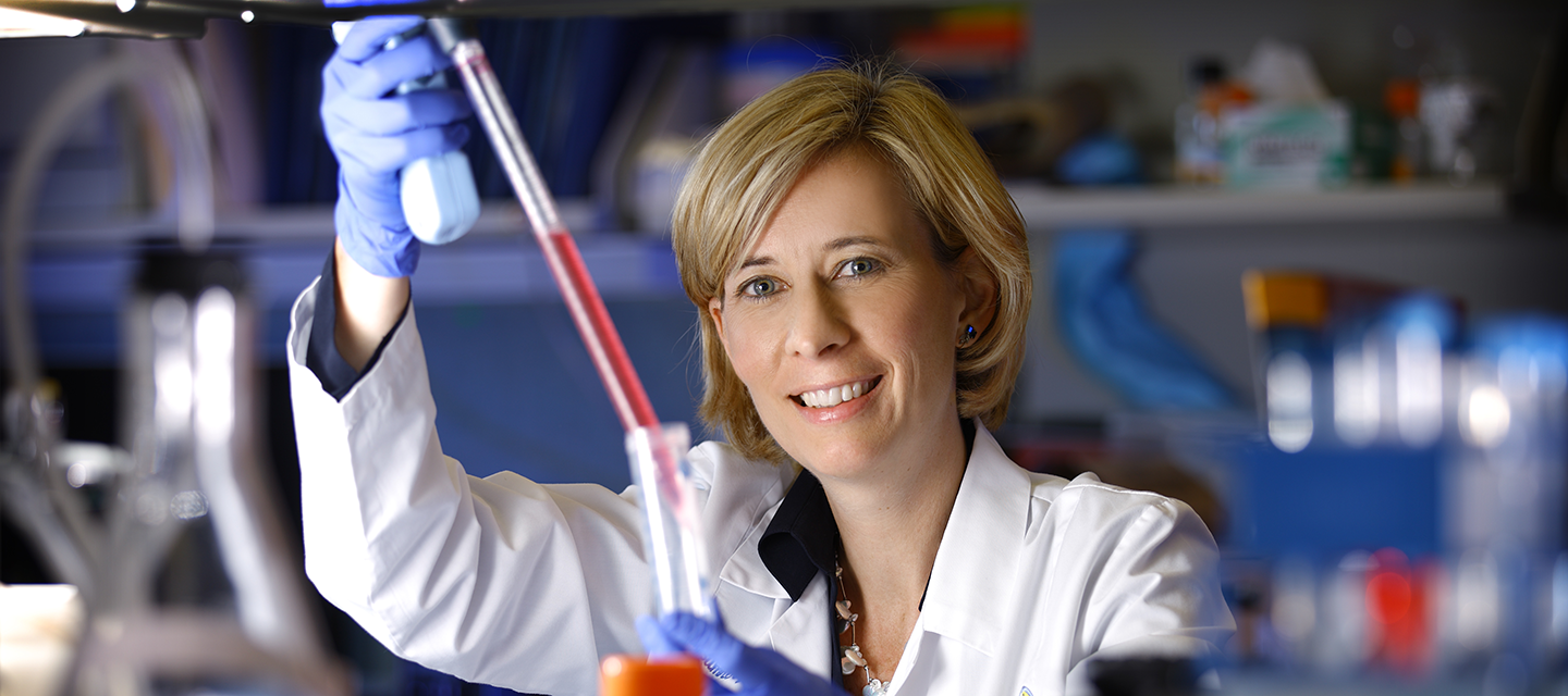 Neurologist Charlotte Sumner poses while doing research